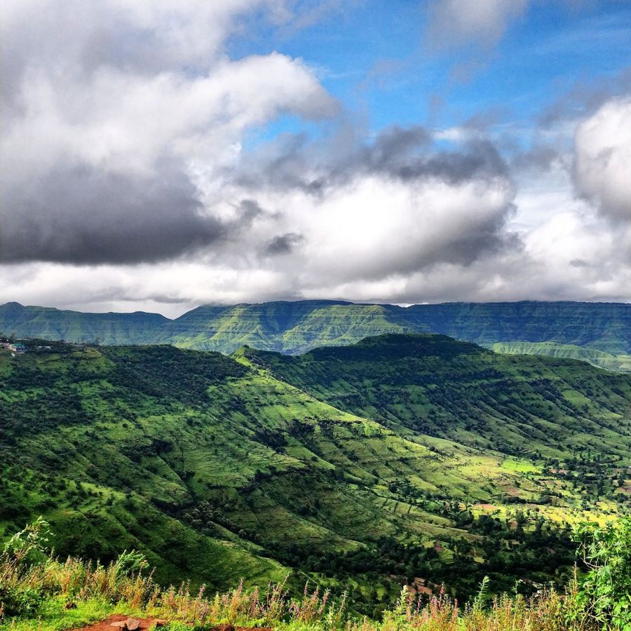 Clouds over the green table-top hills