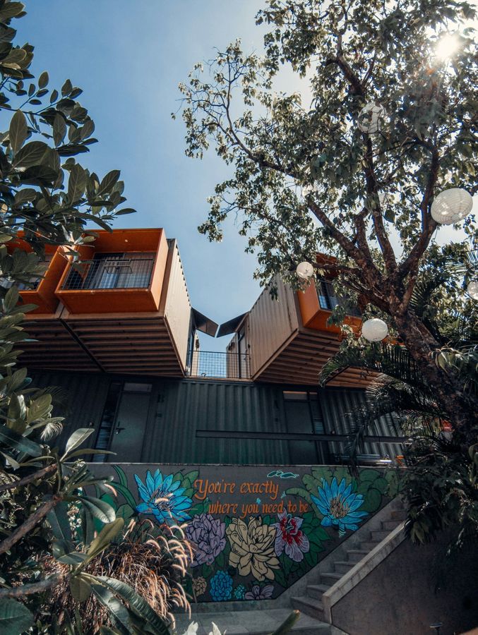 A stay among trees with a painted floral mural