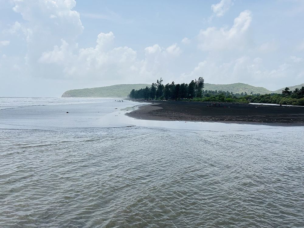 A quiet beach and headland near Harihareshwar